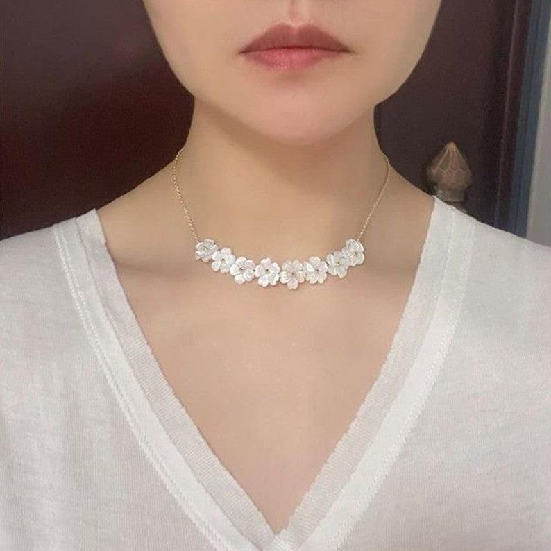 Eight-Flower Alloy Necklace with Decorative Stones