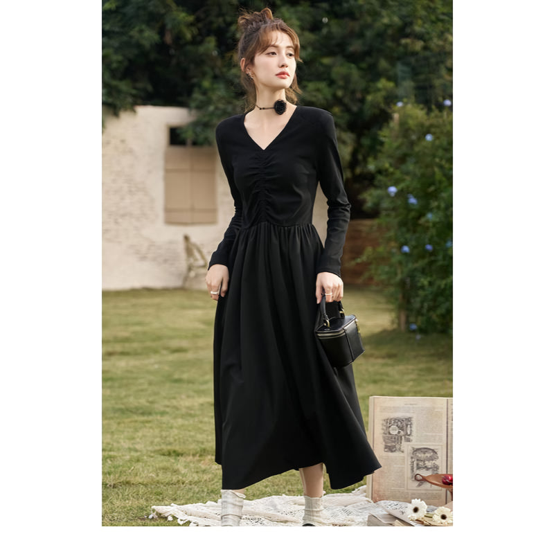 Elegant Black Knitted Smocked V-neck A-line Midi Dress