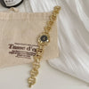 Color: Gold Strap Black Surface