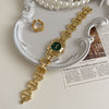 Color: Gold Strap Green Surface