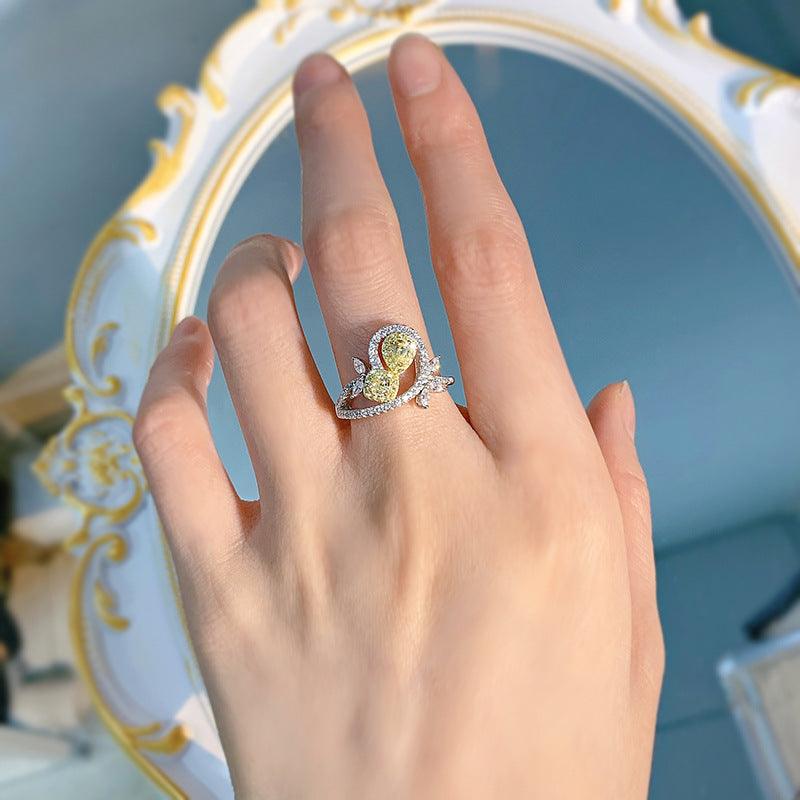 Silver Leaf-Style Ring with Yellow Stone