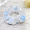 Color: White with blue flowers