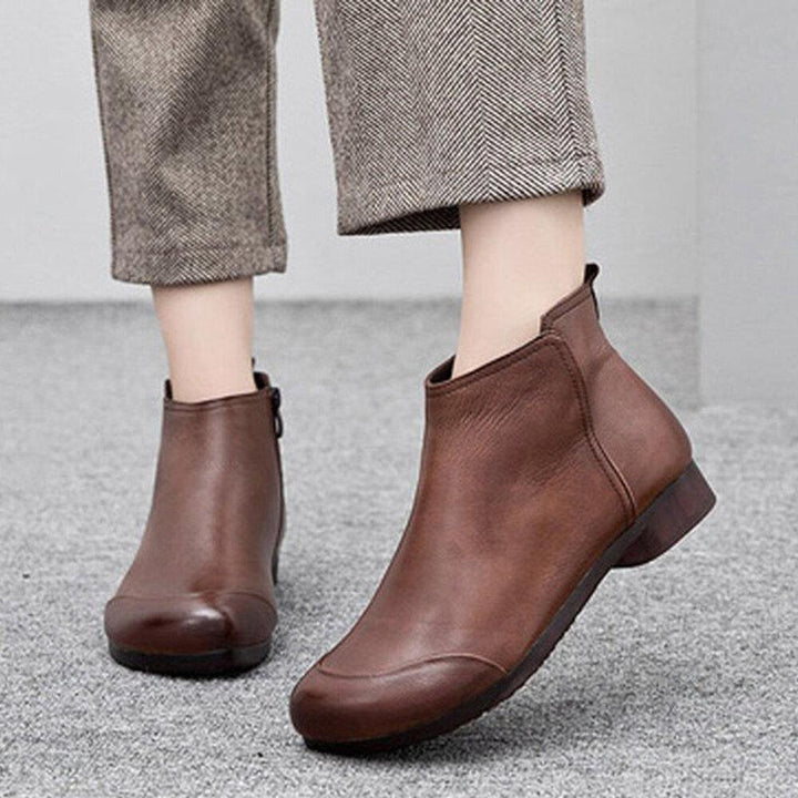 Plus Size Women Casual Solid Wide Fit Side Zipper Flat Ankle Boots - Trendha